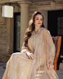 Styled seated portrait in a Golden Beige Korean Raw Silk suit, eyes closed