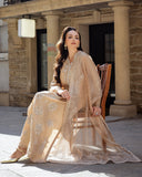 Styled seated portrait in a Golden Beige Korean Raw Silk suit with the dupatta flowing to the floor