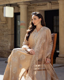 Close-up seated portrait in a Golden Beige Korean Raw Silk suit, glancing to the side