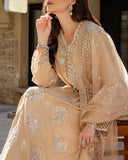 Close-up portrait in a Golden Beige Korean Raw Silk suit, hand raised to the chin