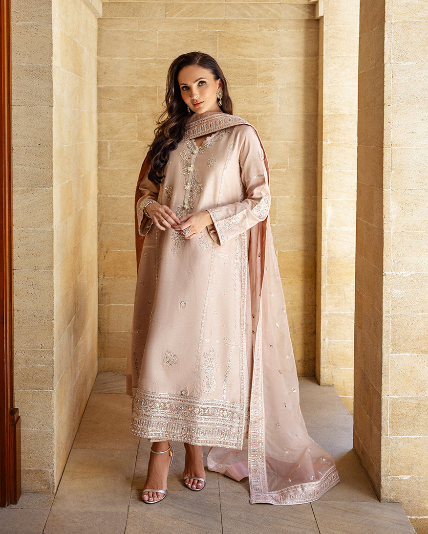Close-up of embroidered rose beige raw silk shirt with sheer organza dupatta draped on shoulder