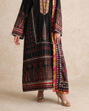 Close-up of embroidered hem border and striped dupatta on black printed raw silk suit