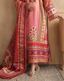 Close-up of embroidered neckline and sleeve cuff on peach printed raw silk suit