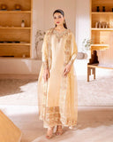 Woman wearing a beige luxury pret suit with embroidered detailing, Zarminay collection