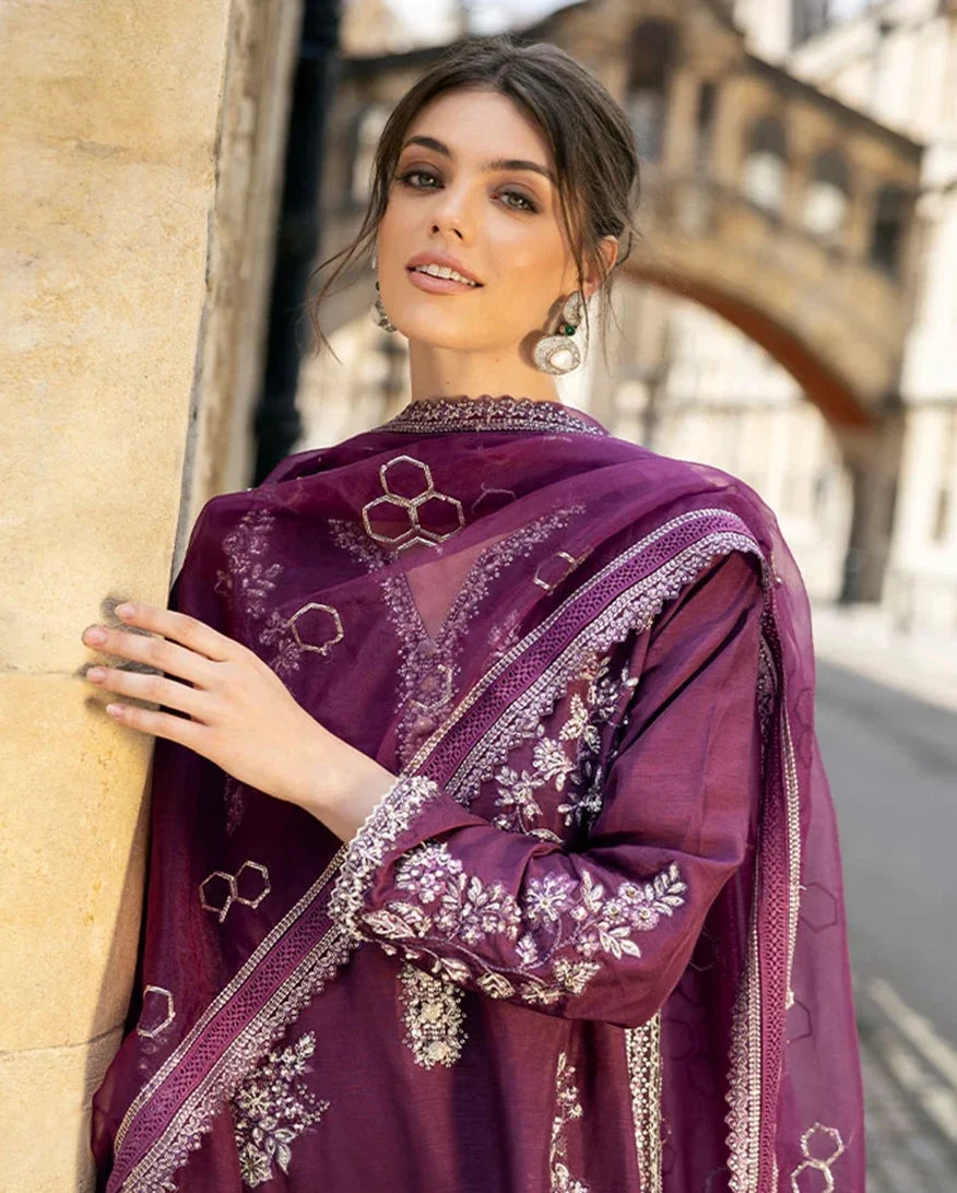 Close-up portrait in a Purple Raw Silk suit with crystal and dabka embellished neckline