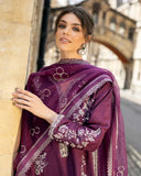 Close-up portrait in a Purple Raw Silk suit with crystal and dabka embellished neckline