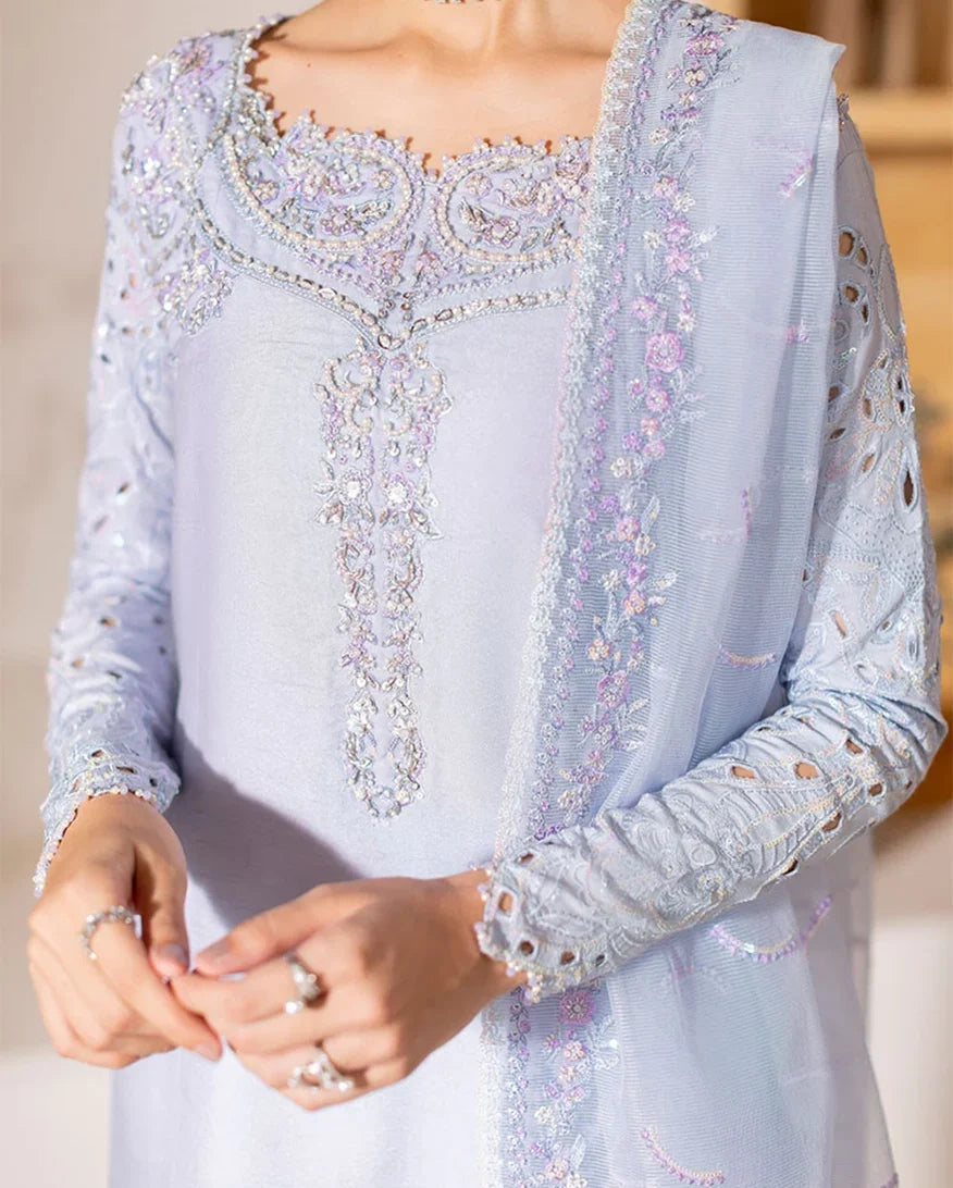 Close-up of neckline and sleeve embroidery on light blue luxury pret suit, Zarminay collection