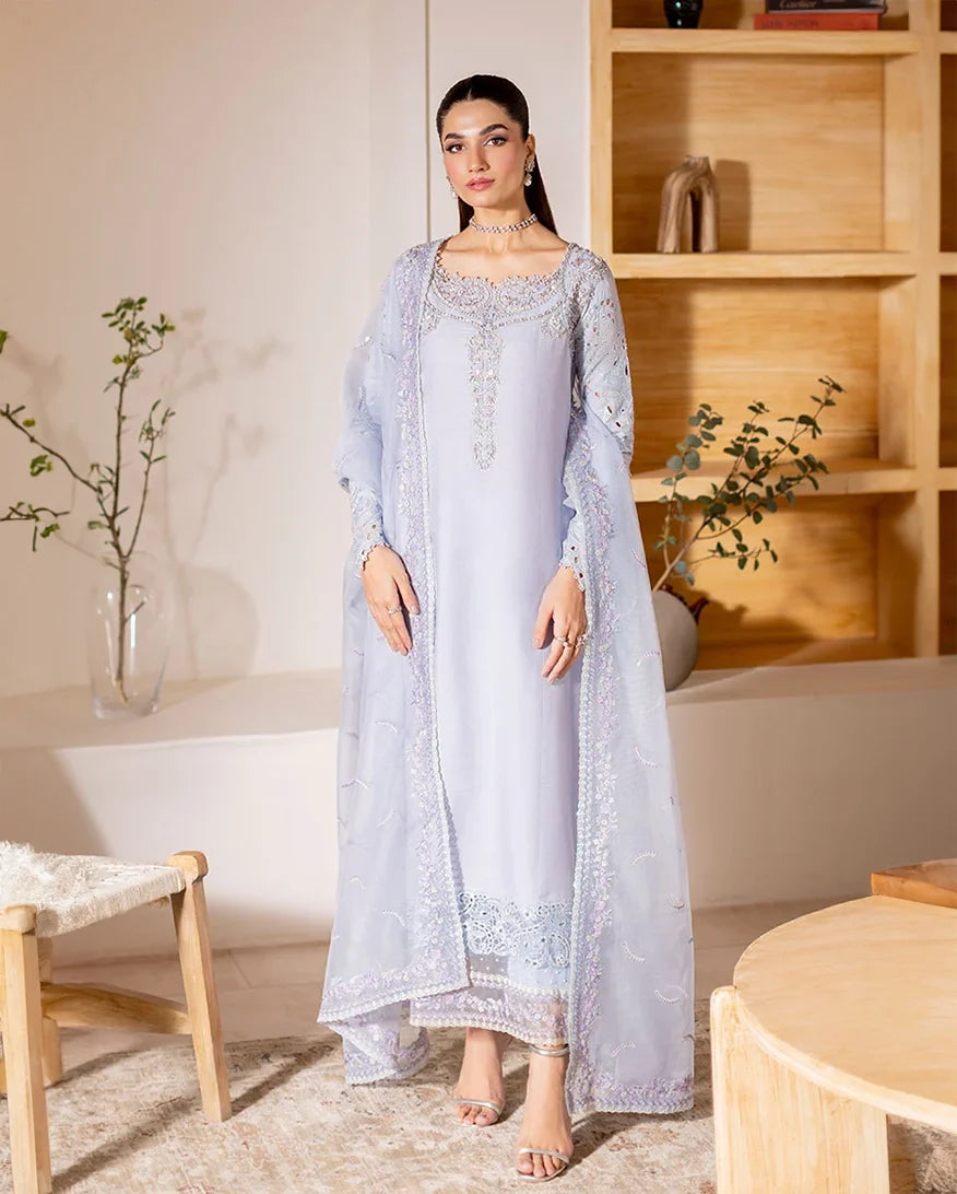 Front-facing view of light blue luxury pret suit with embroidered hem, Zarminay collection