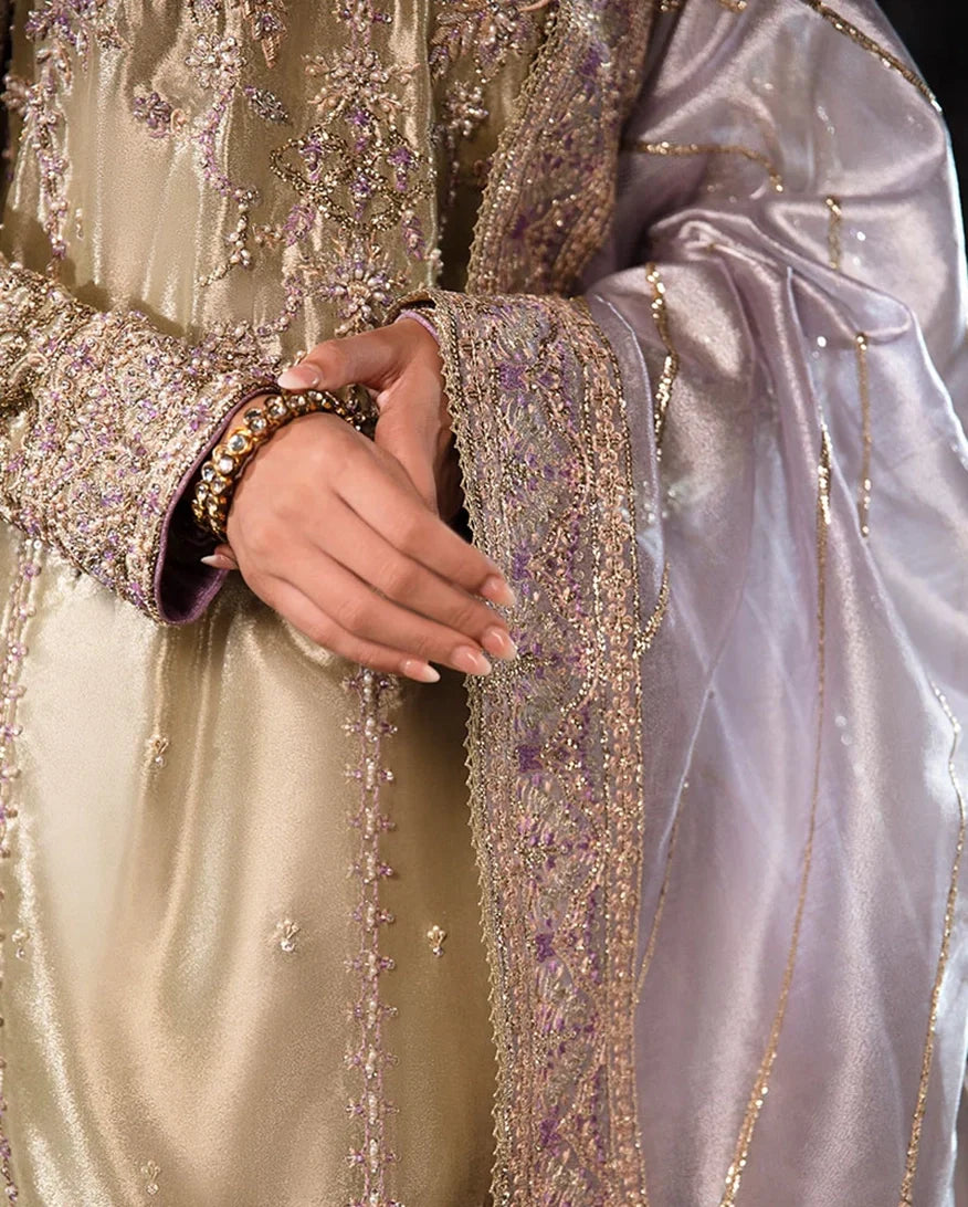 Close-up of embroidered sleeve cuff and dupatta border on Mint Green Silver Zarri Silk suit