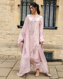 Woman wearing Astrid pink raw silk suit with resham embroidery and cutwork lace border dupatta