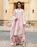 Woman wearing Astrid pink raw silk suit with resham embroidery and cutwork lace border dupatta