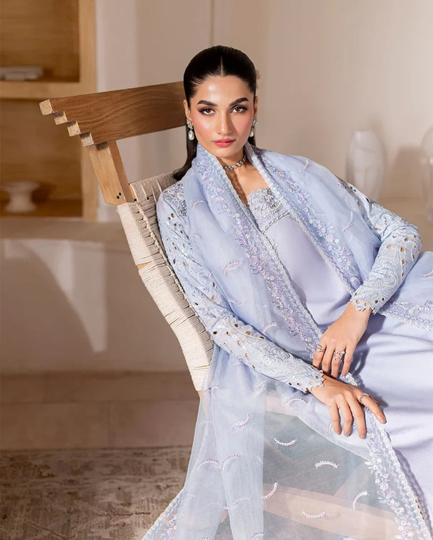 Seated styled shot of light blue luxury pret suit with embroidered dupatta, Zarminay collection