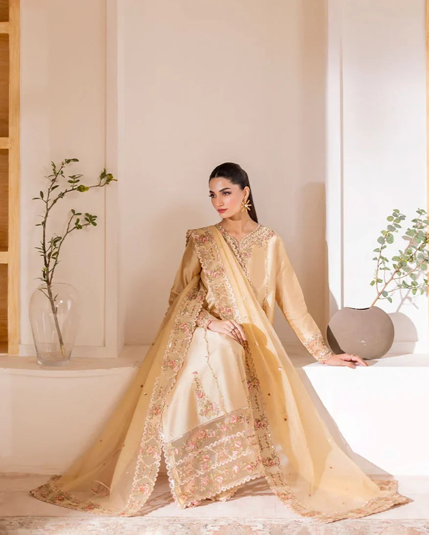 Seated styled shot of beige luxury pret suit with floral embroidered dupatta, Zarminay collection