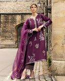 Woman wearing a Purple embroidered Raw Silk suit with resham and crystal embellishment