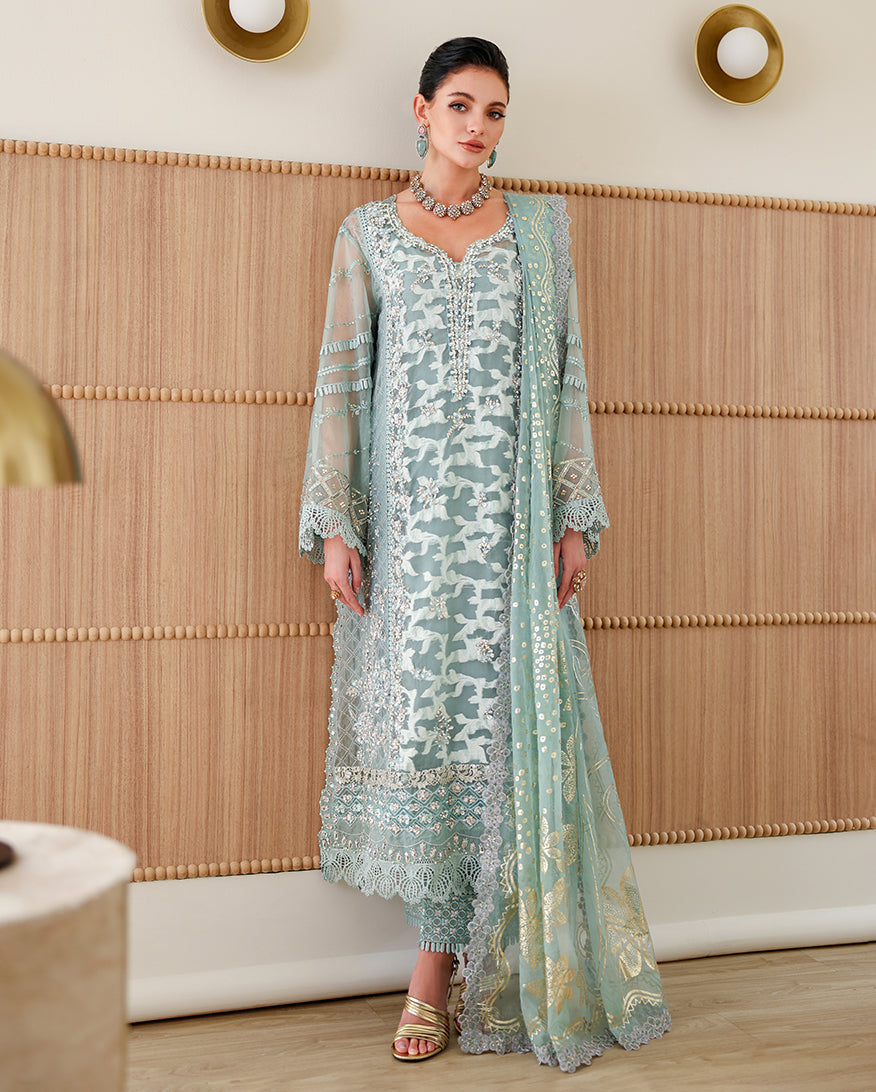 Woman wearing Aqua Green Organza embroidered pret kurta with sheer gold dupatta, Espoir collection by Mushq