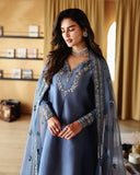 Close-up of neckline and cuff embroidery on blue luxury pret suit, Zarminay collection