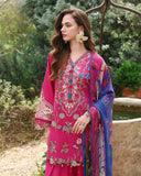 Woman wearing fuchsia lawn unstitched collection suit with floral earrings and blue printed dupatta, Secret Garden collection