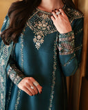 Close-up of neckline and sleeve embroidery on teal blue luxury pret suit, Zarminay collection