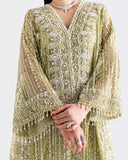 Close-up of lime green net kaftan bodice with sheer organza dupatta draped in front