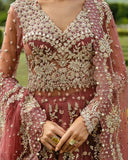 Close-up of a Tea Pink Net bridal dress with floral embroidery, a bridal brand in Pakistan