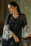 Close-up of the embroidered floral sleeve cuff on a Black Net suit