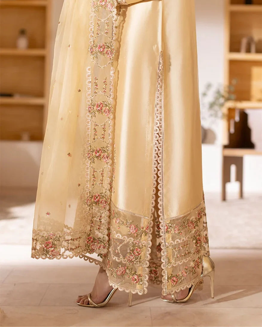 Close-up of floral embroidered hemline on beige luxury pret suit, Zarminay collection