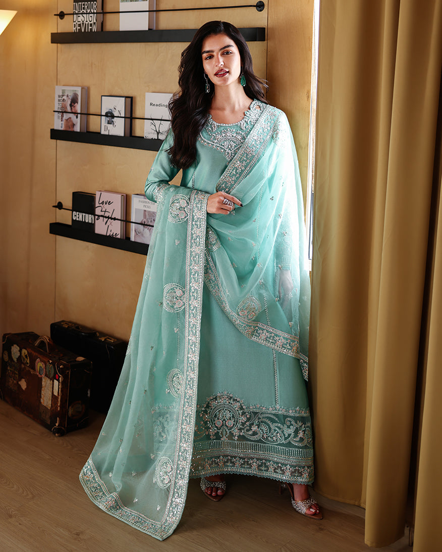 Full-length front view of mint green luxury pret suit with embroidered hem, Zarminay collection