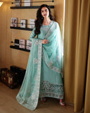 Full-length front view of mint green luxury pret suit with embroidered hem, Zarminay collection