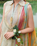 Close-up of tassel neckline and floral wrist corsage on lemon yellow embroidered lawn collection suit, Secret Garden collection