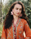 Close-up of orange unstitched lawn suit with beaded tassel necklace and floral embroidery, Secret Garden collection