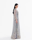 Side view of grey net suit showing beaded fringe skirt and embroidered bodice