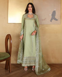 Woman wearing a sage green luxury pret suit with silver mirror-work embroidery, Zarminay collection