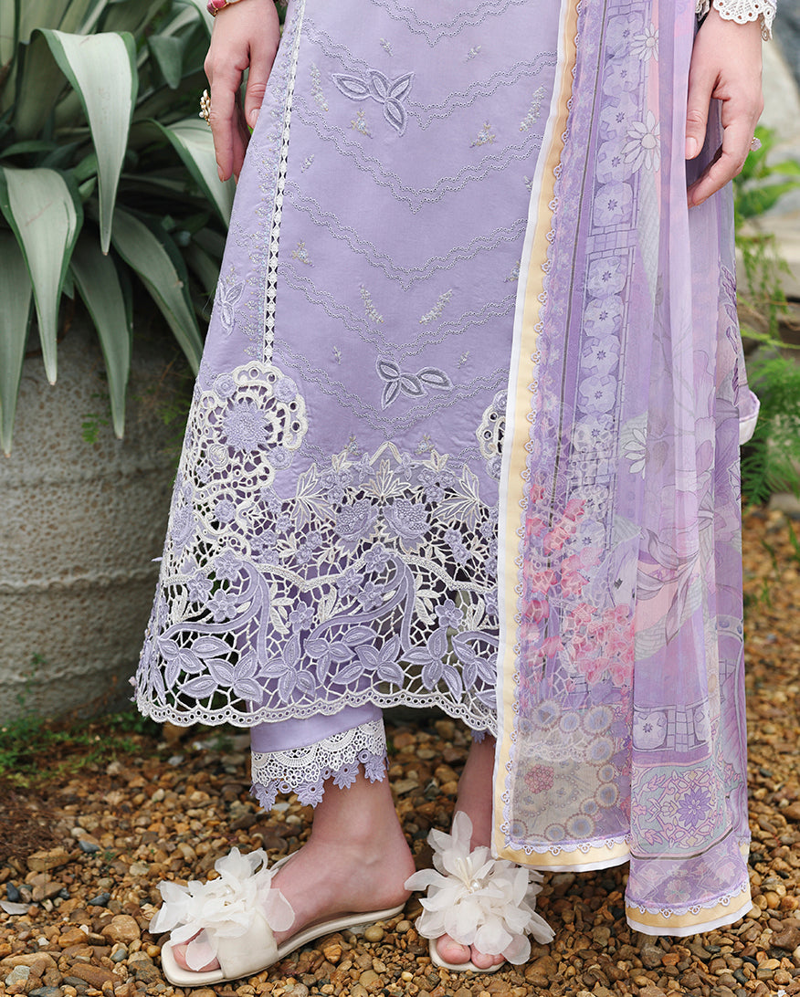 Close-up of lace hem detail on lavender unstitched lawn suit with floral sandals, Secret Garden collection
