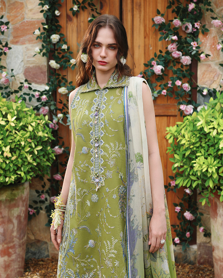 Woman wearing olive green unstitched lawn collection suit with collar neckline and beaded bracelet, Secret Garden collection