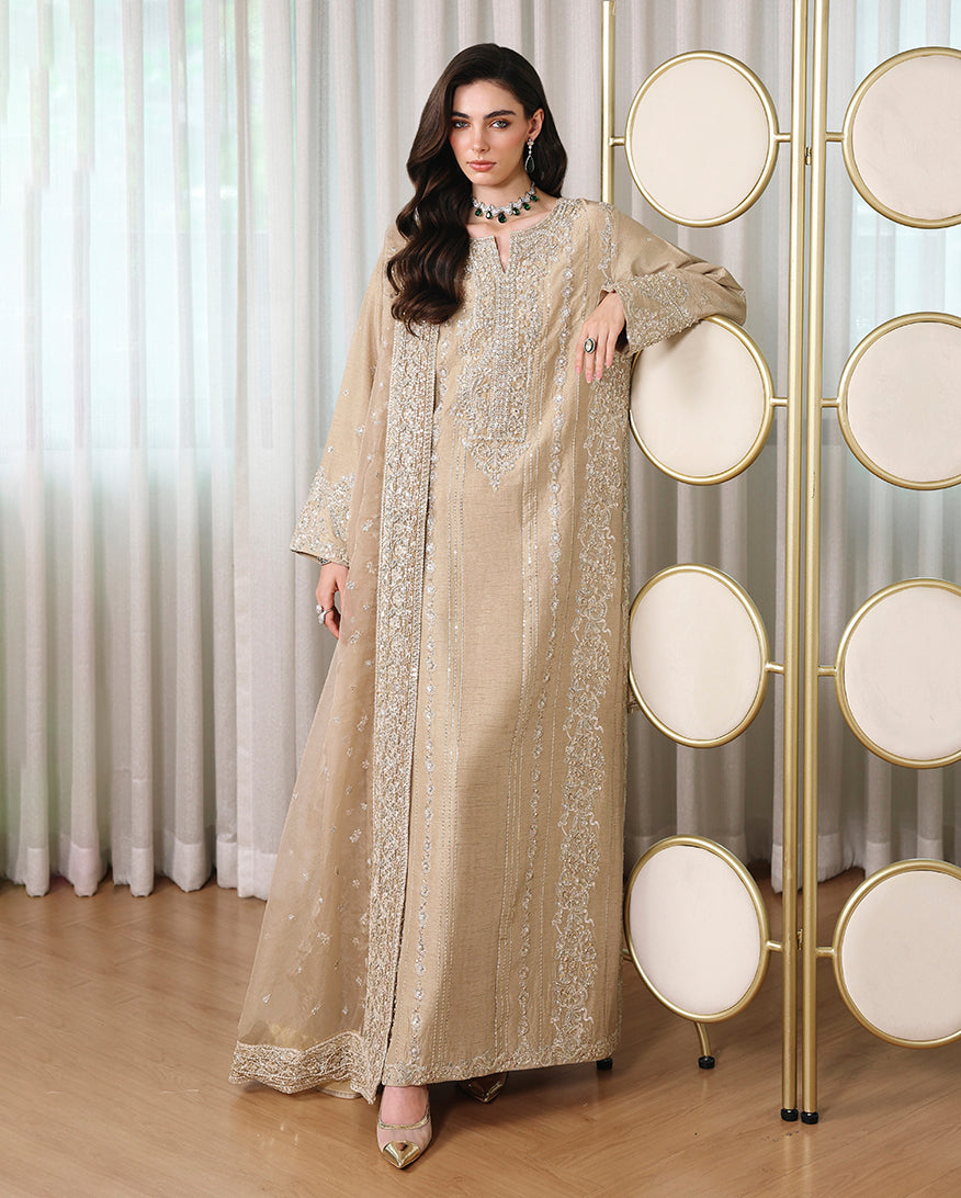 Woman wearing beige Korean raw silk suit with embroidered neckline and organza dupatta, straight hemline
