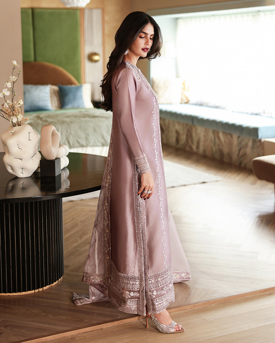 Side view of dusty mauve luxury pret suit with embroidered border, Zarminay collection